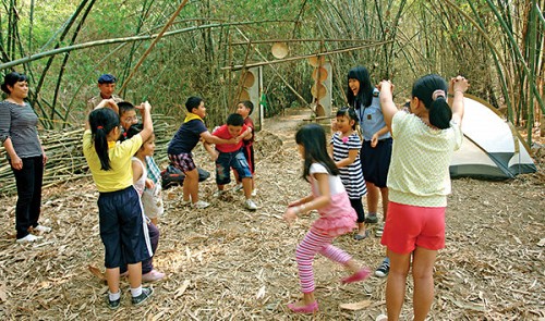 This file photo show children are playing in a rural area in Vietnam.   Tuoi Tre
