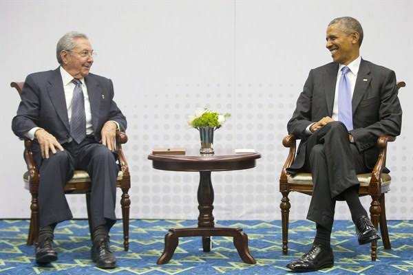President Barack Obama and Cuban President Raul Castro during their historic meeting at the Summit  of the Americas, Panama City, Panama, April 11, 2015 (AP photo by Pablo Martinez Monsivais). 